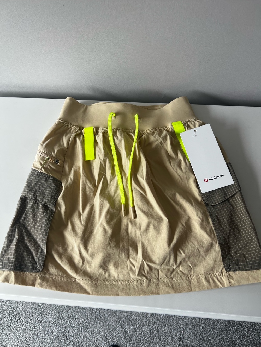 lululemon athletica Tan Mini Skirt with Neon Yellow Accents
